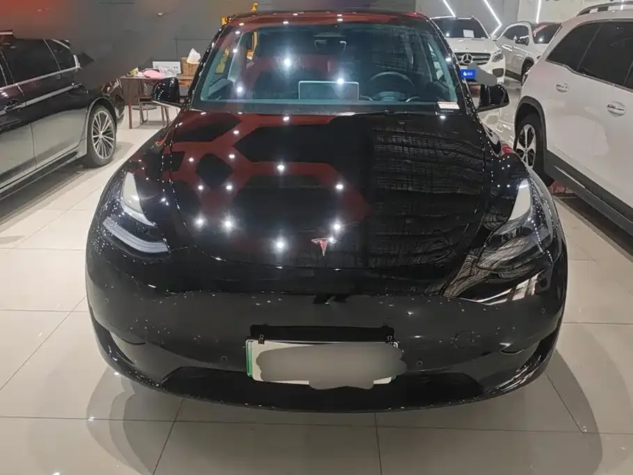 Tesla Model Y — фото 9