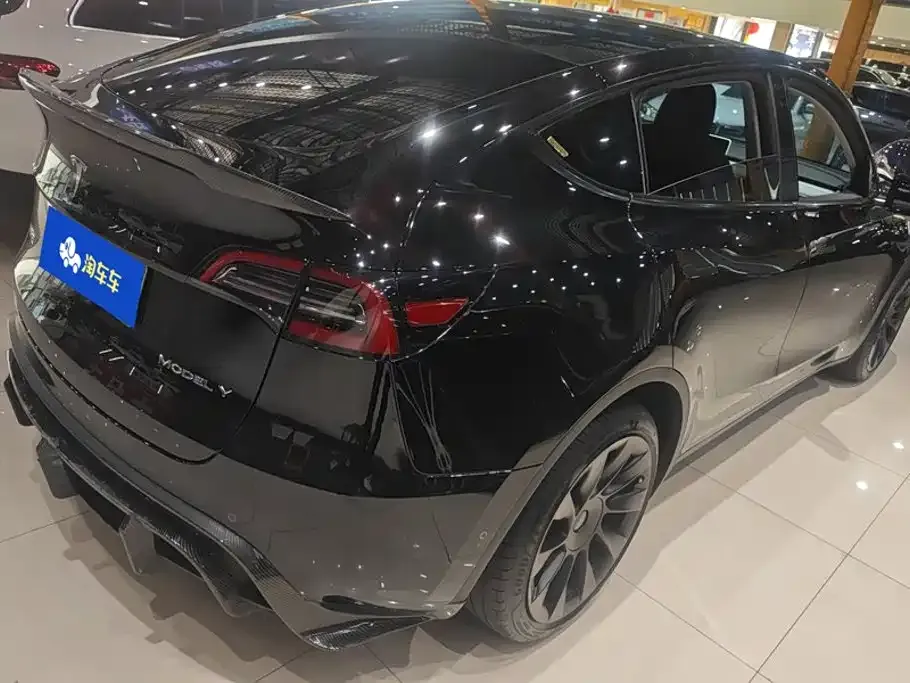 Tesla Model Y — фото 10