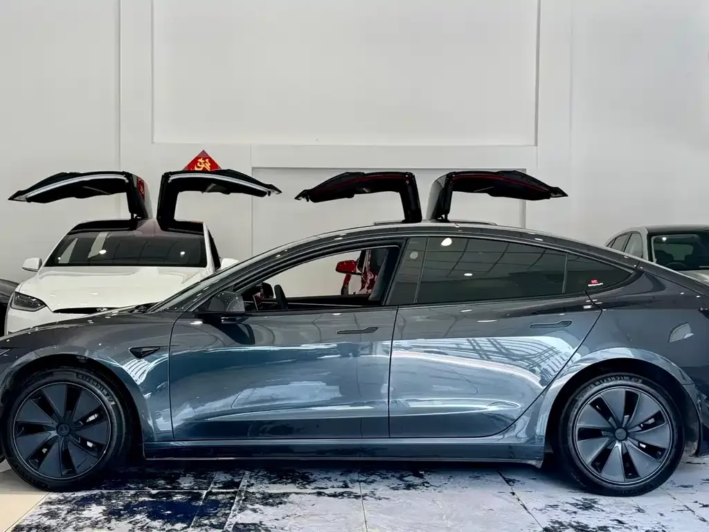 Tesla Model 3 — фото 9