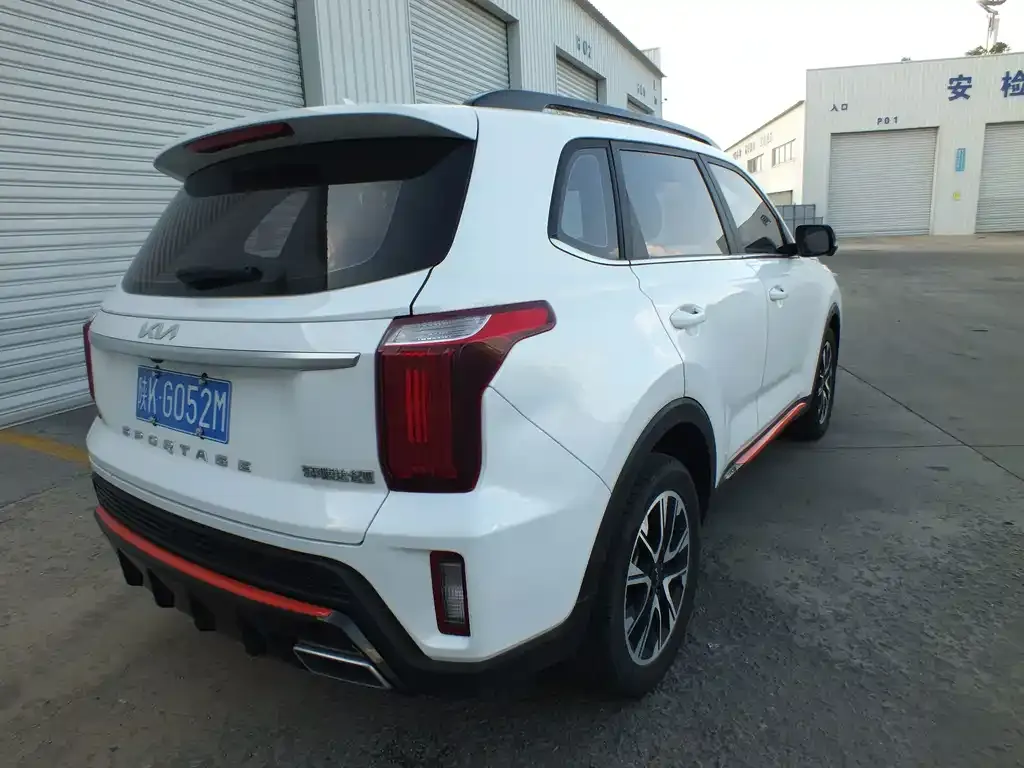Kia Sportage — фото 8