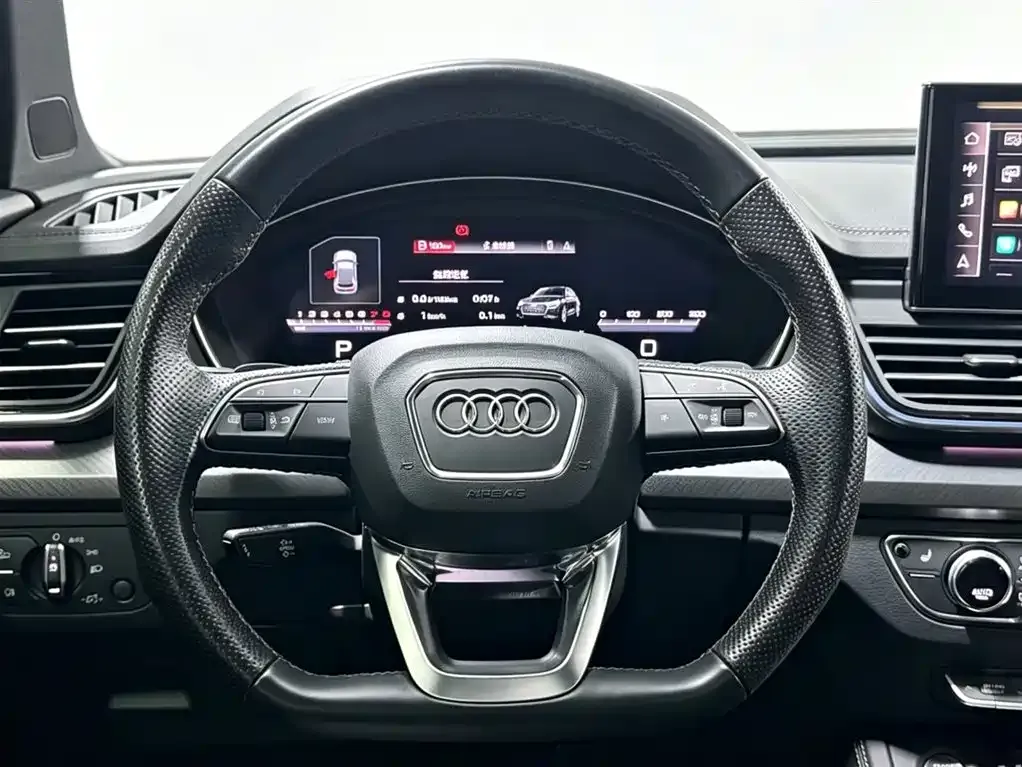 Audi Q5L — фото 7