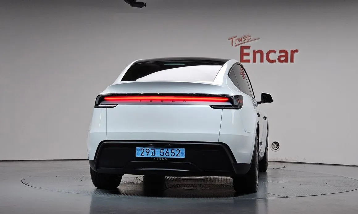 Tesla Model Y — фото 7