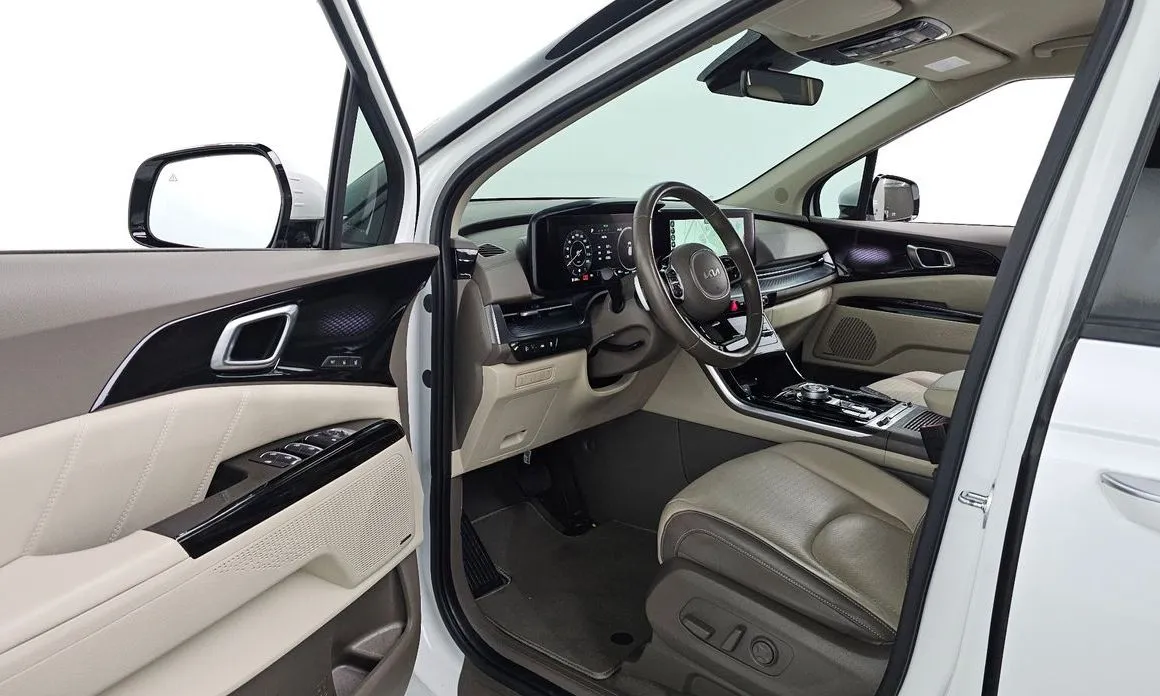 Kia Carnival — фото 10