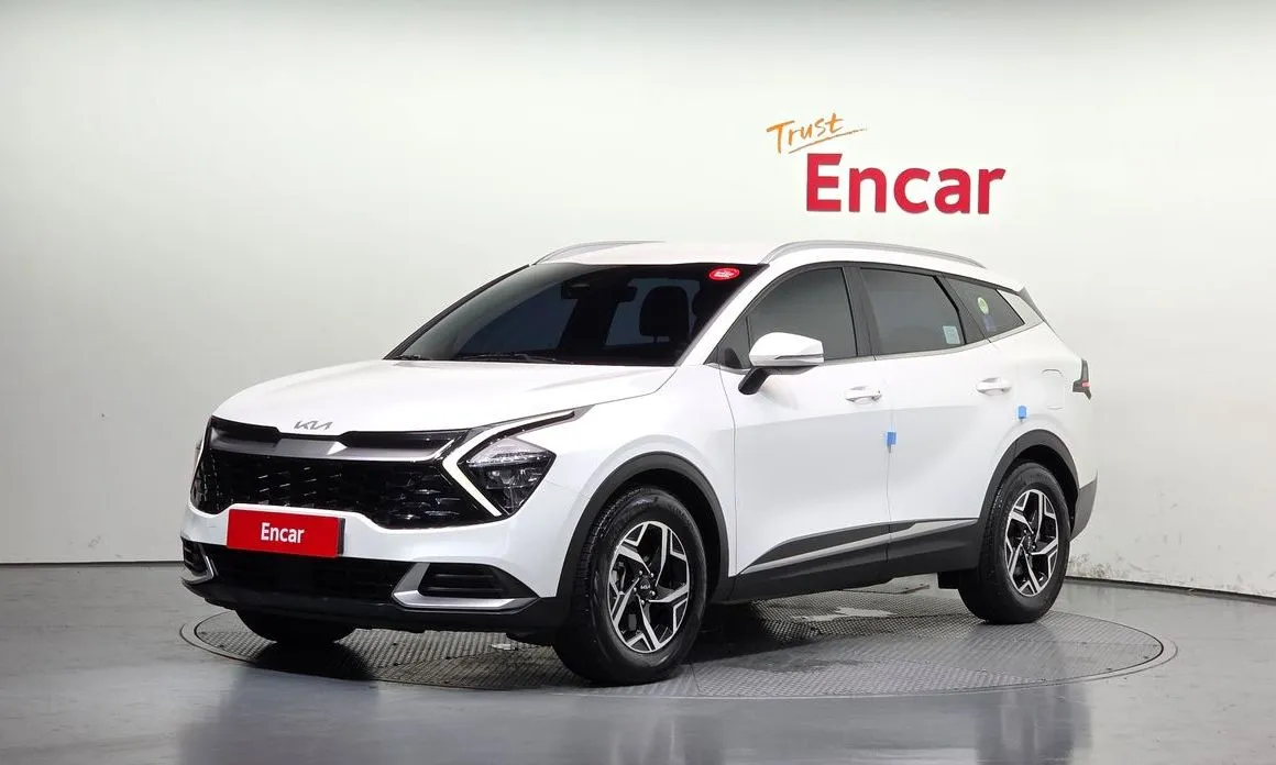 Kia Sportage — фото 1