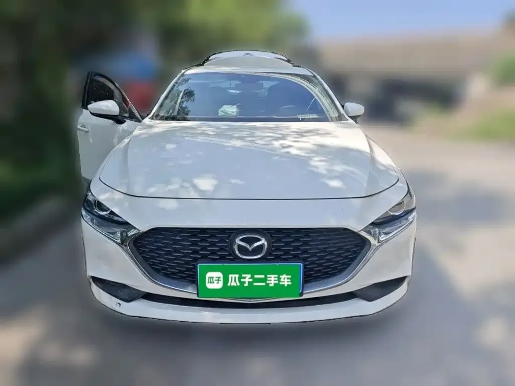 Mazda 3 Axela — фото 4