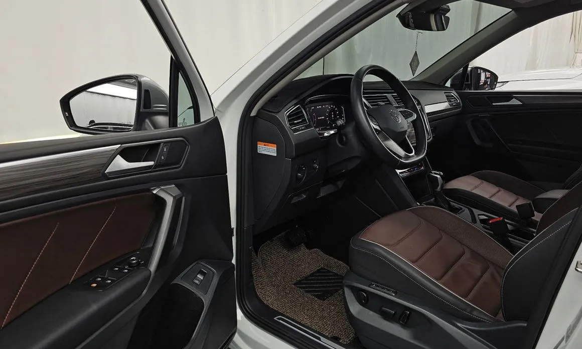 Volkswagen Tiguan — фото 2