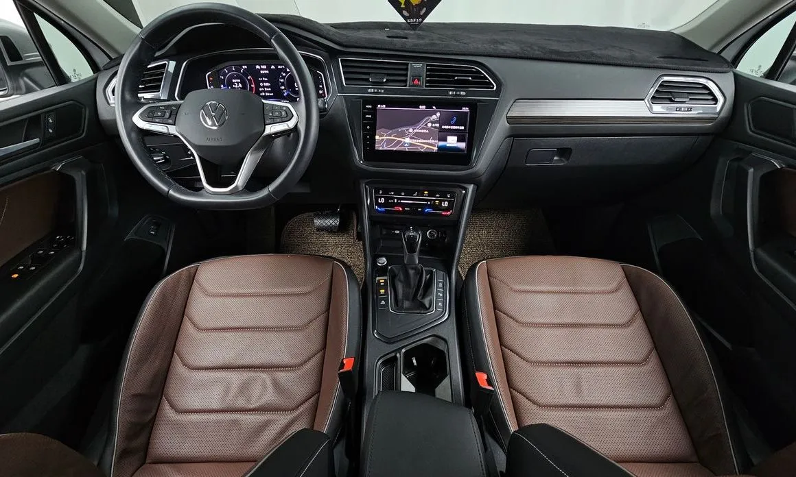Volkswagen Tiguan — фото 10