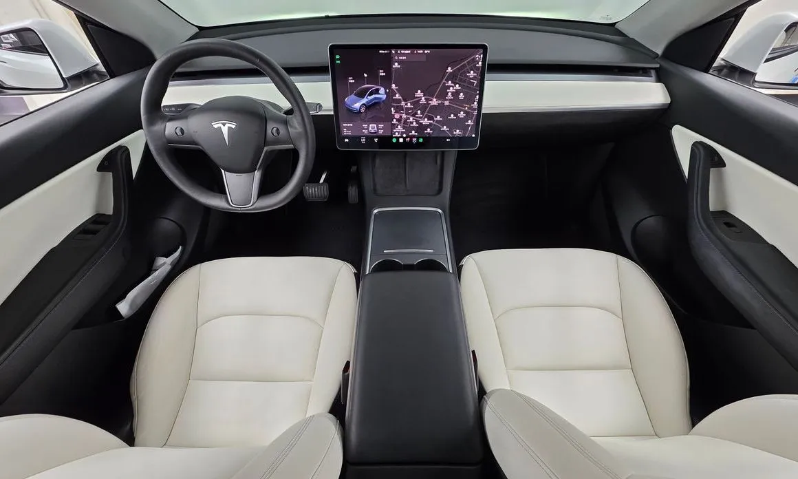 Tesla Model Y — фото 9