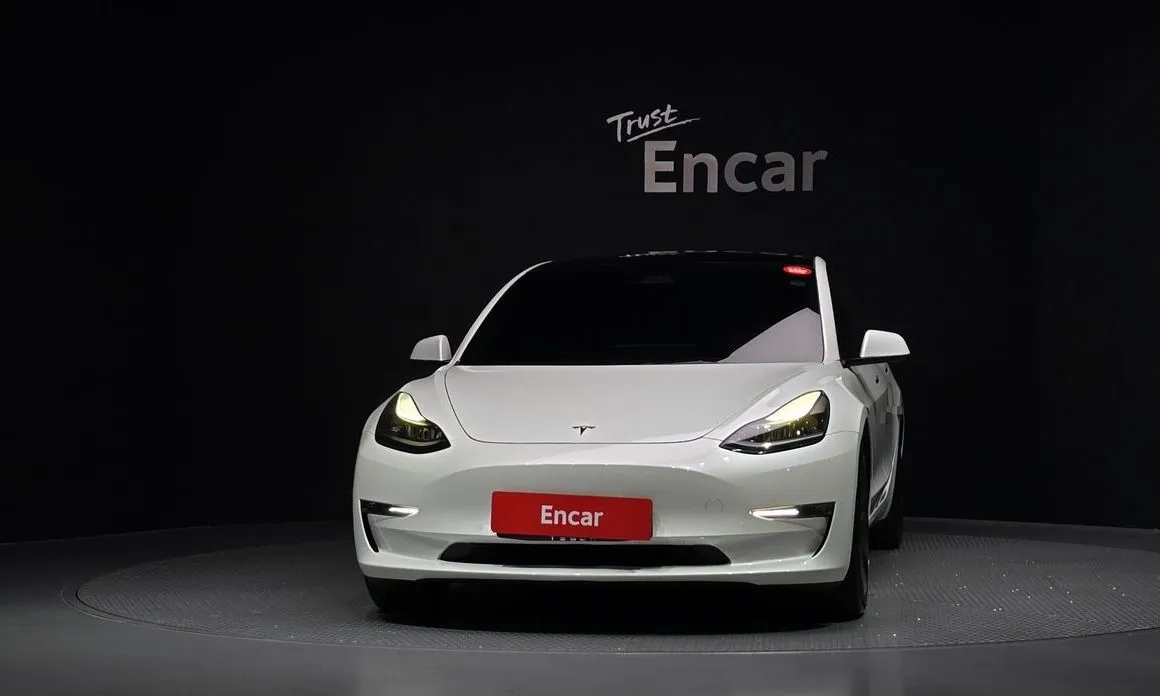 Tesla Model 3 — фото 9
