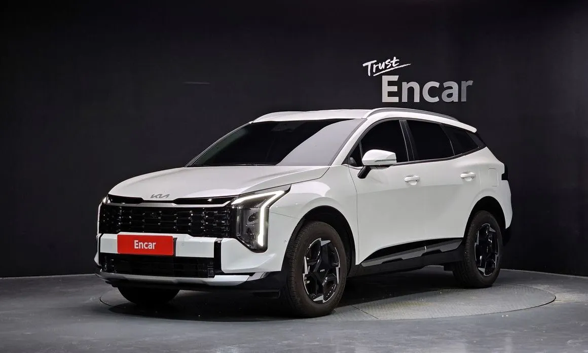 Kia Sportage — фото 1