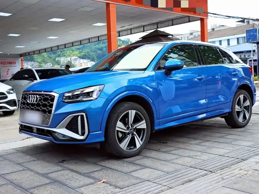 Audi Q2L — фото 7