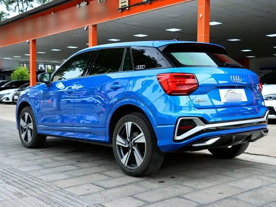 Audi Q2L — фото 6