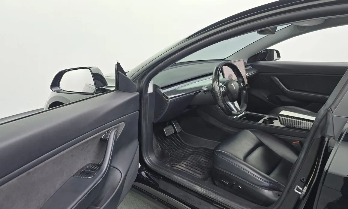 Tesla Model 3 — фото 9