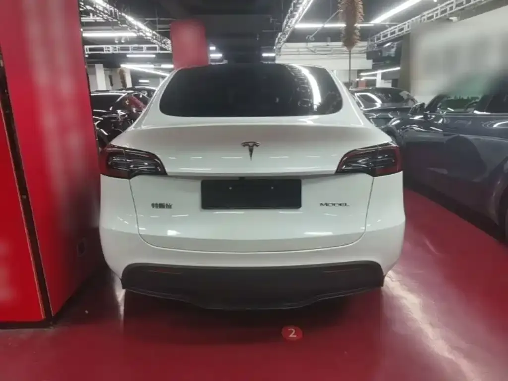 Tesla Model Y — фото 7