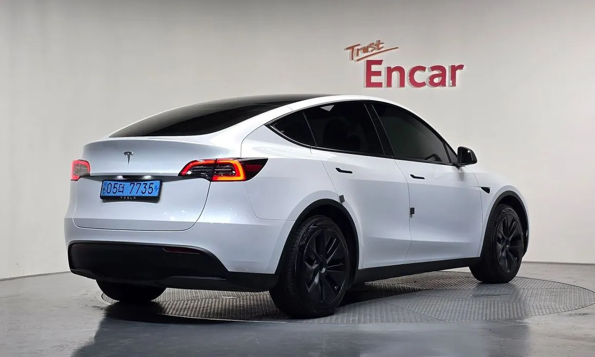Tesla Model Y — фото 6