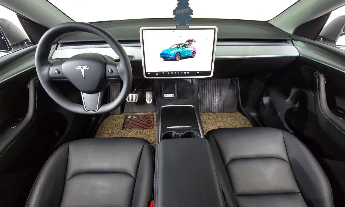 Tesla Model Y — фото 9