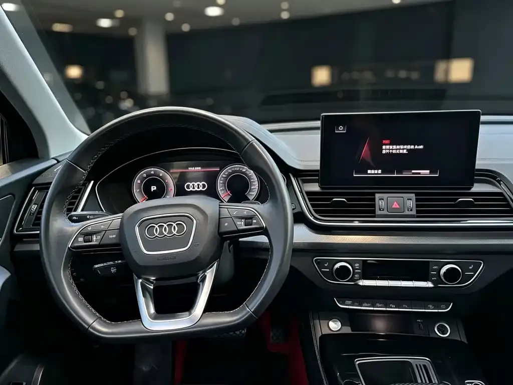 Audi Q5L — фото 5