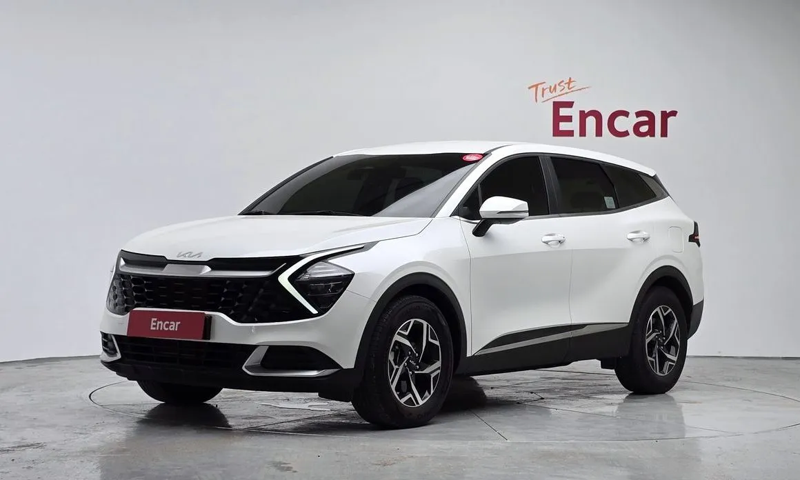 Kia Sportage — фото 1
