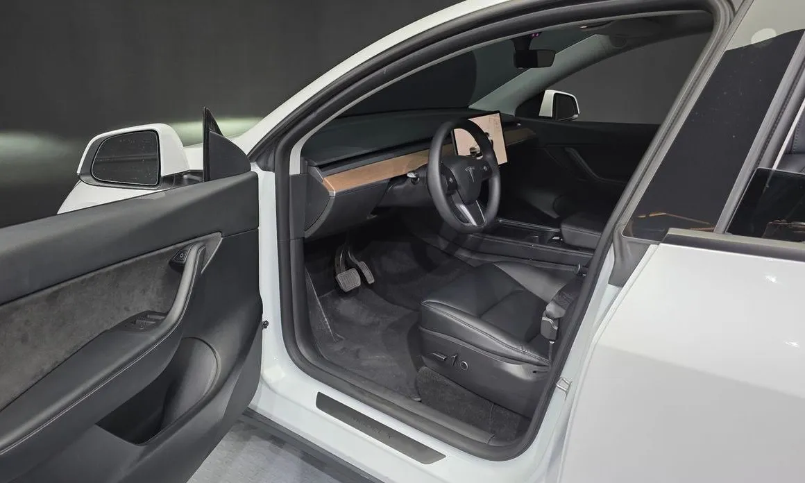 Tesla Model Y — фото 7