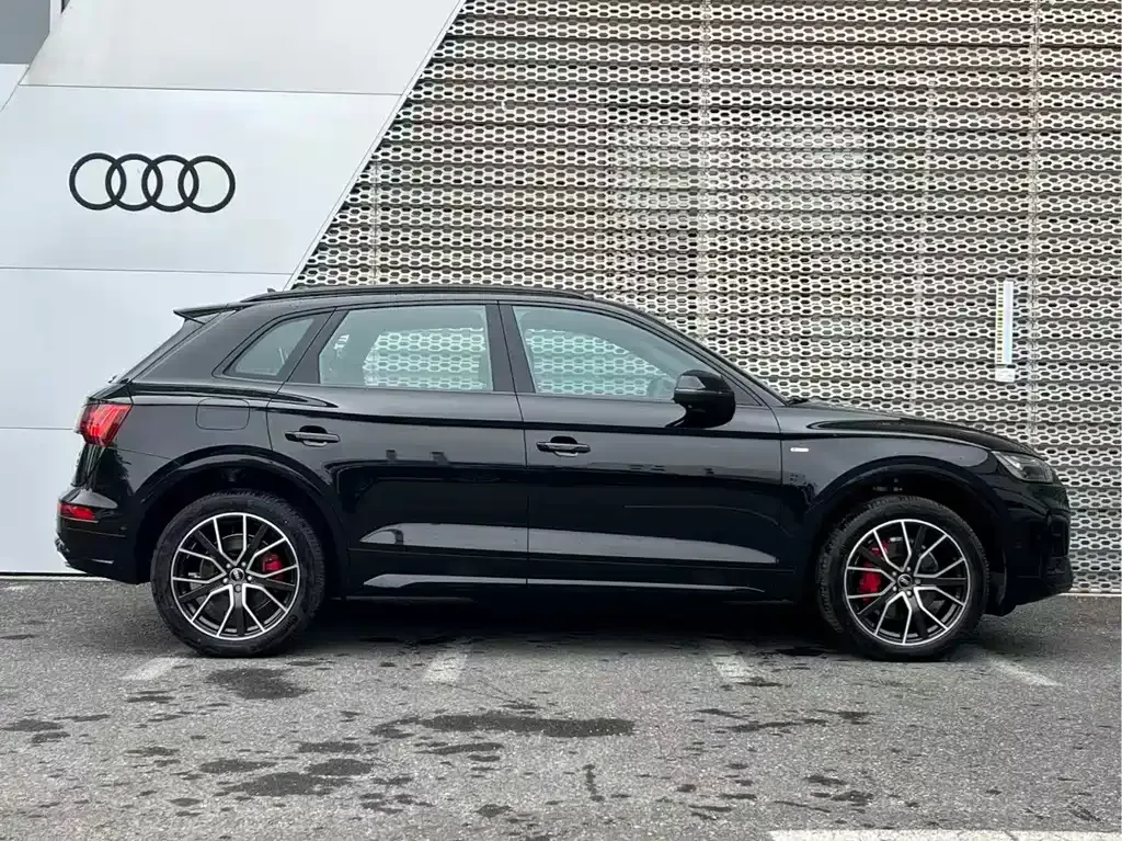 Audi Q5L — фото 8