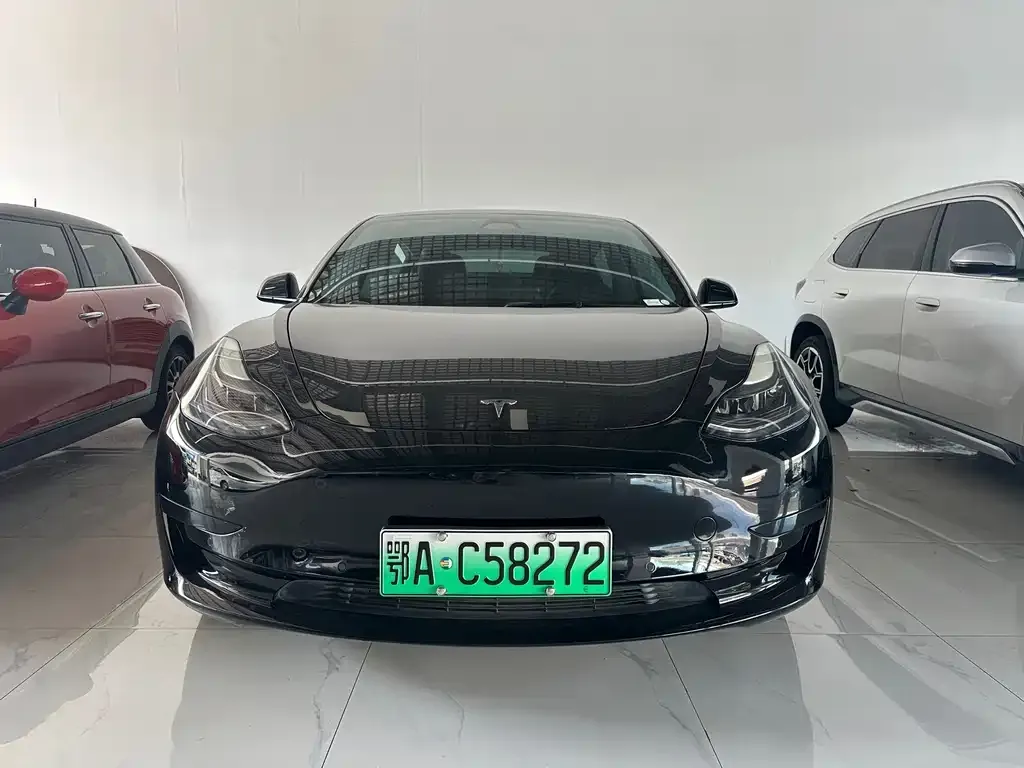 Tesla Model 3 — фото 7