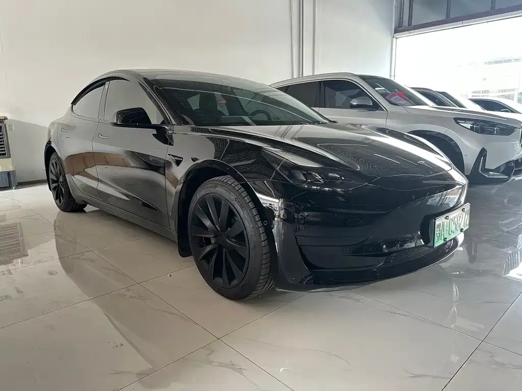 Tesla Model 3 — фото 9