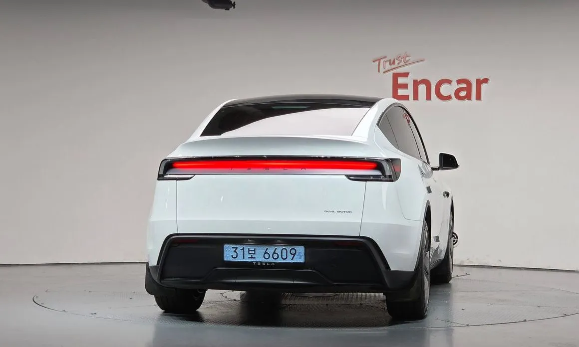 Tesla Model Y — фото 7
