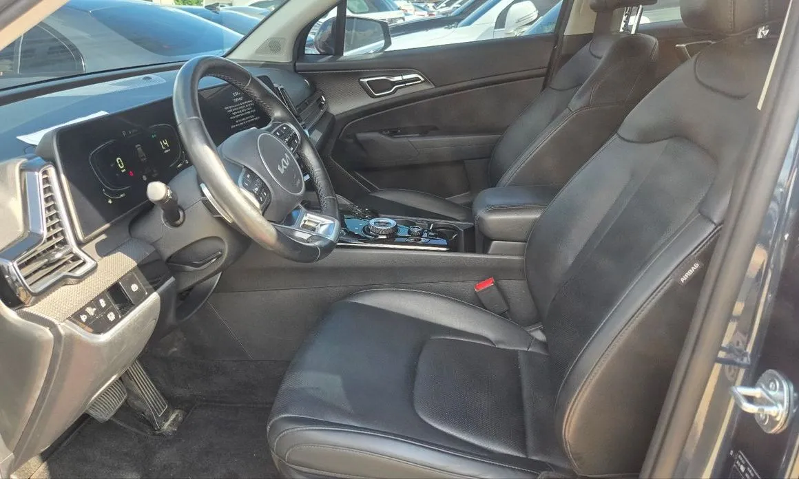 Kia Sportage — фото 9