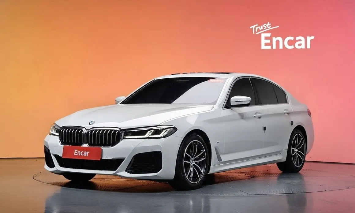 BMW 5-Series — фото 1
