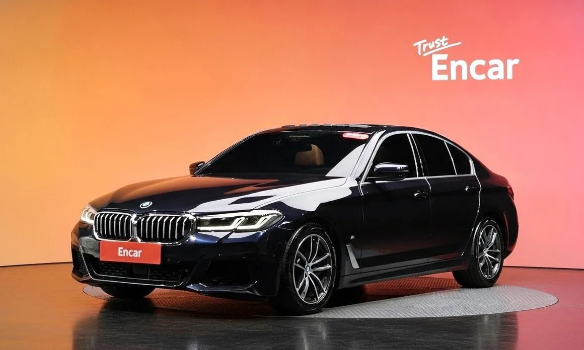 BMW 5-Series — фото 1