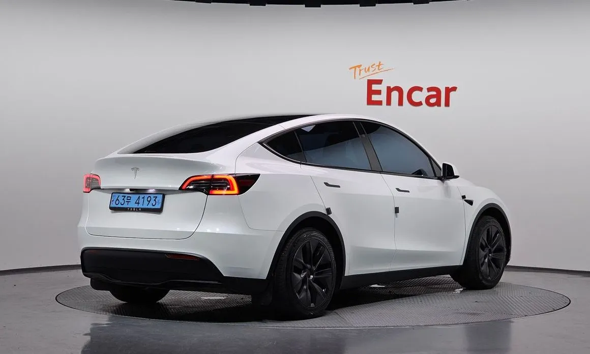 Tesla Model Y — фото 9