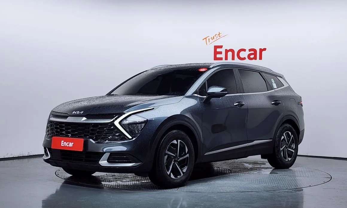 Kia Sportage — фото 1