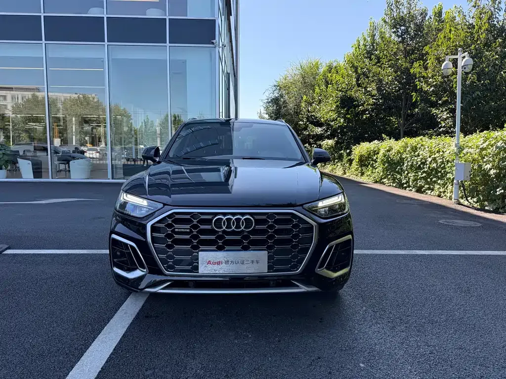Audi Q5L — фото 10