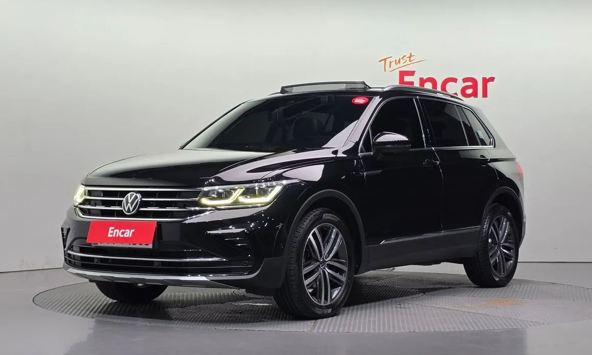 Volkswagen Tiguan — фото 1