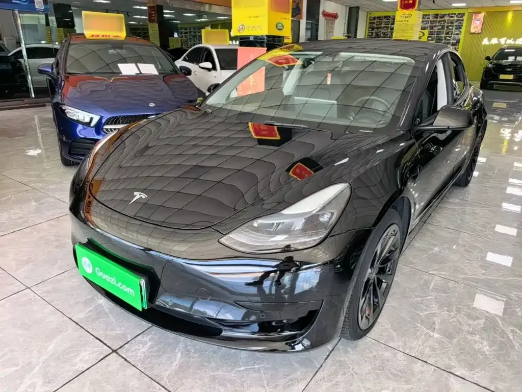 Tesla Model 3 — фото 5