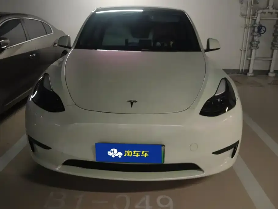 Tesla Model Y — фото 10