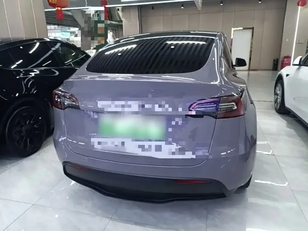 Tesla Model Y — фото 10