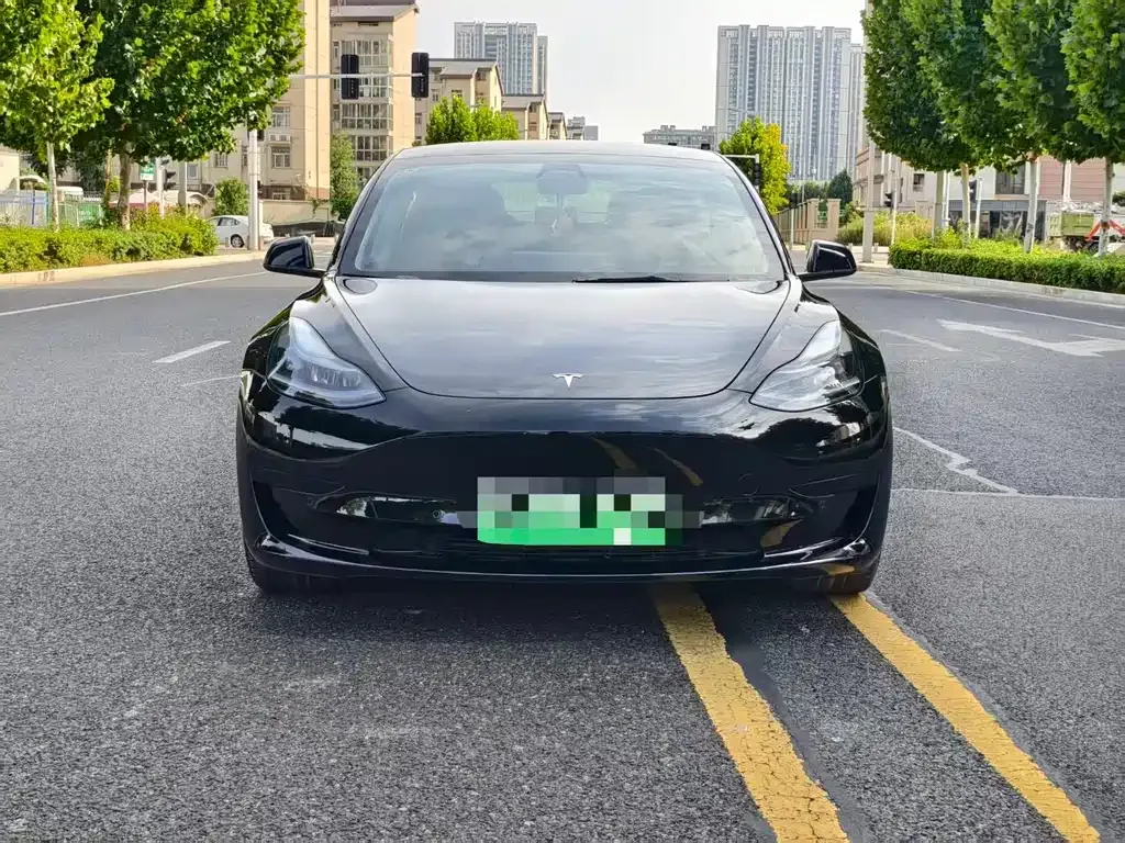 Tesla Model 3 — фото 10