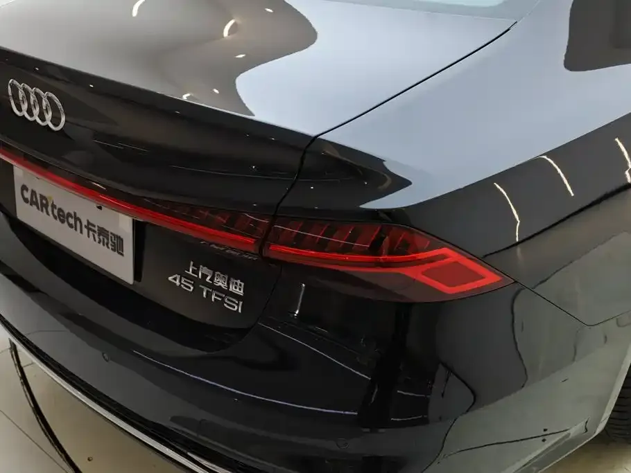 Audi A7L — фото 8