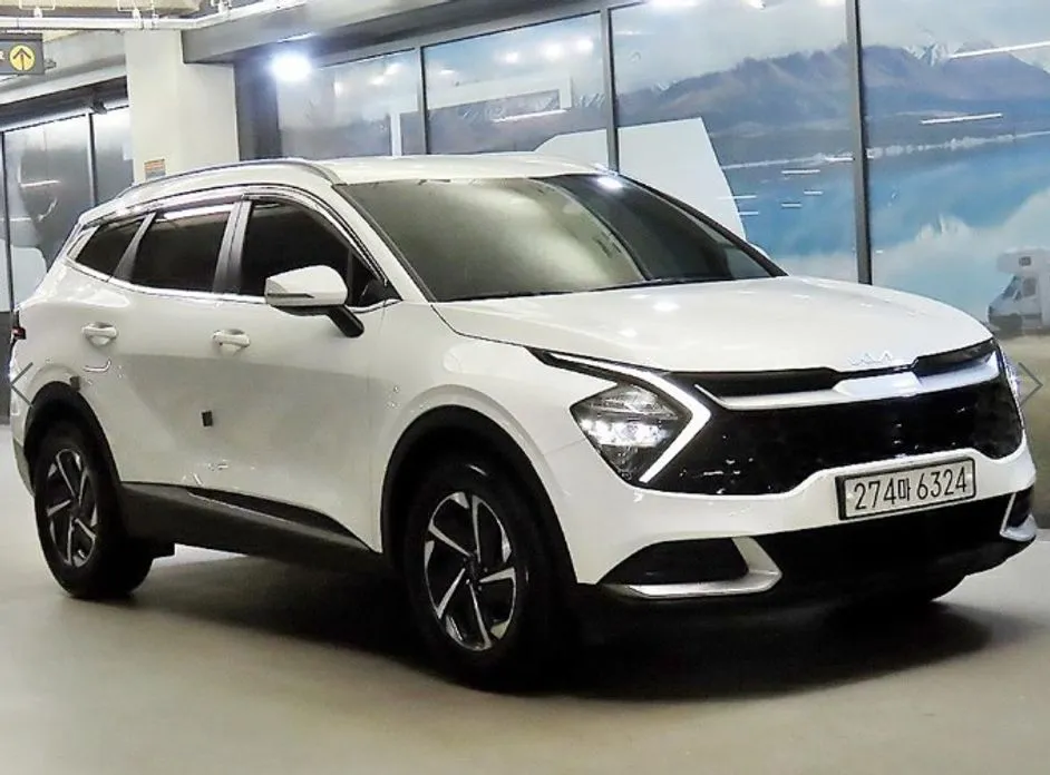 Kia Sportage — фото 1