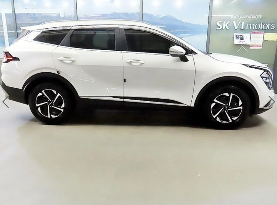 Kia Sportage — фото 7