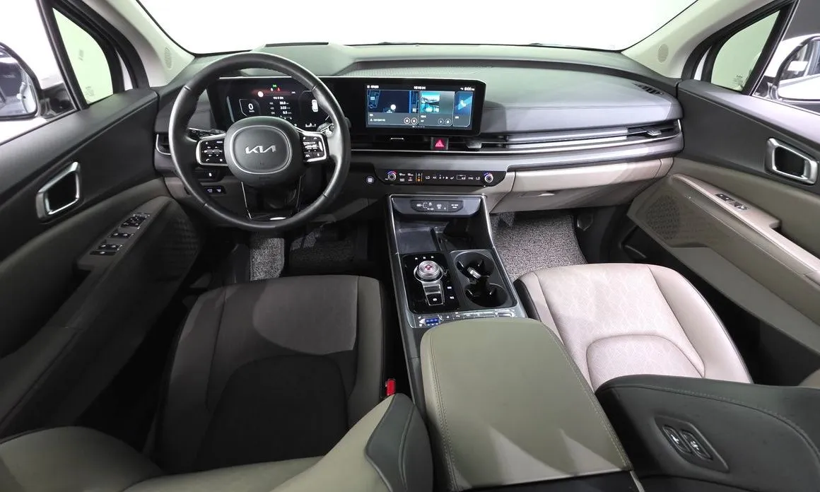 Kia Carnival — фото 10