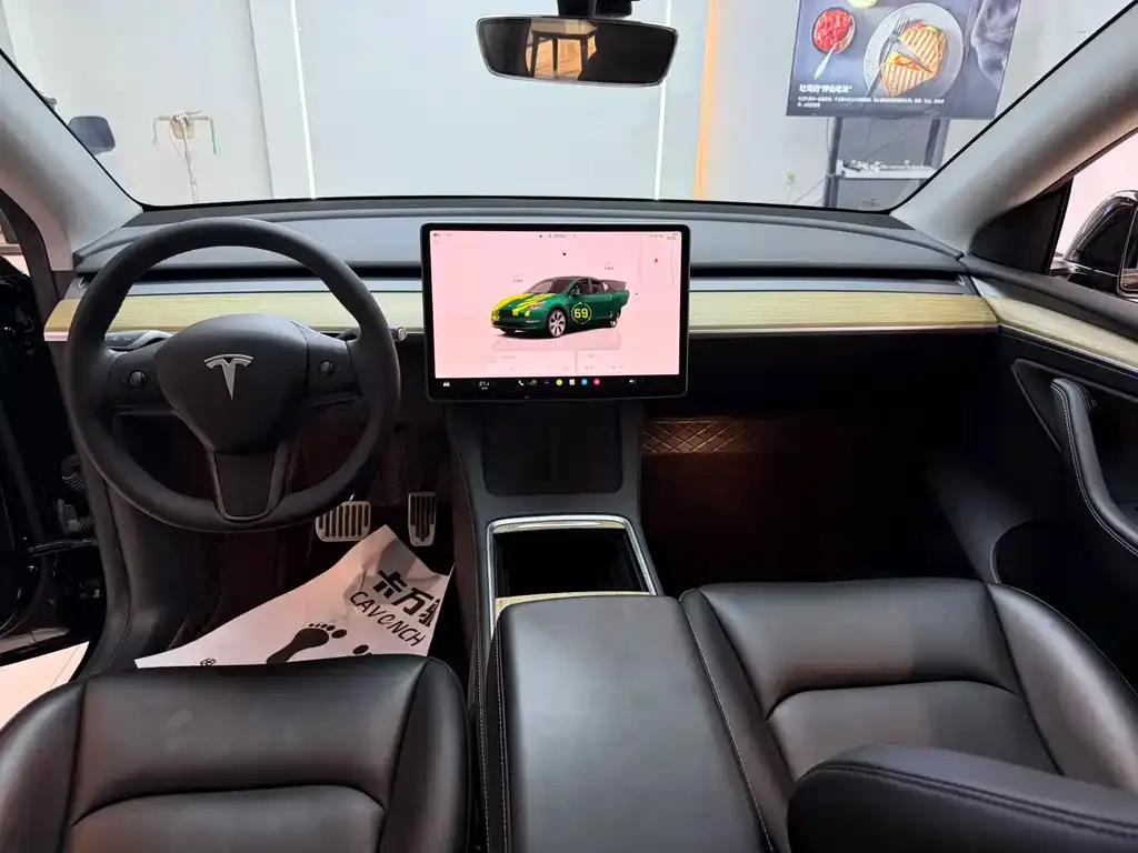 Tesla Model Y — фото 7