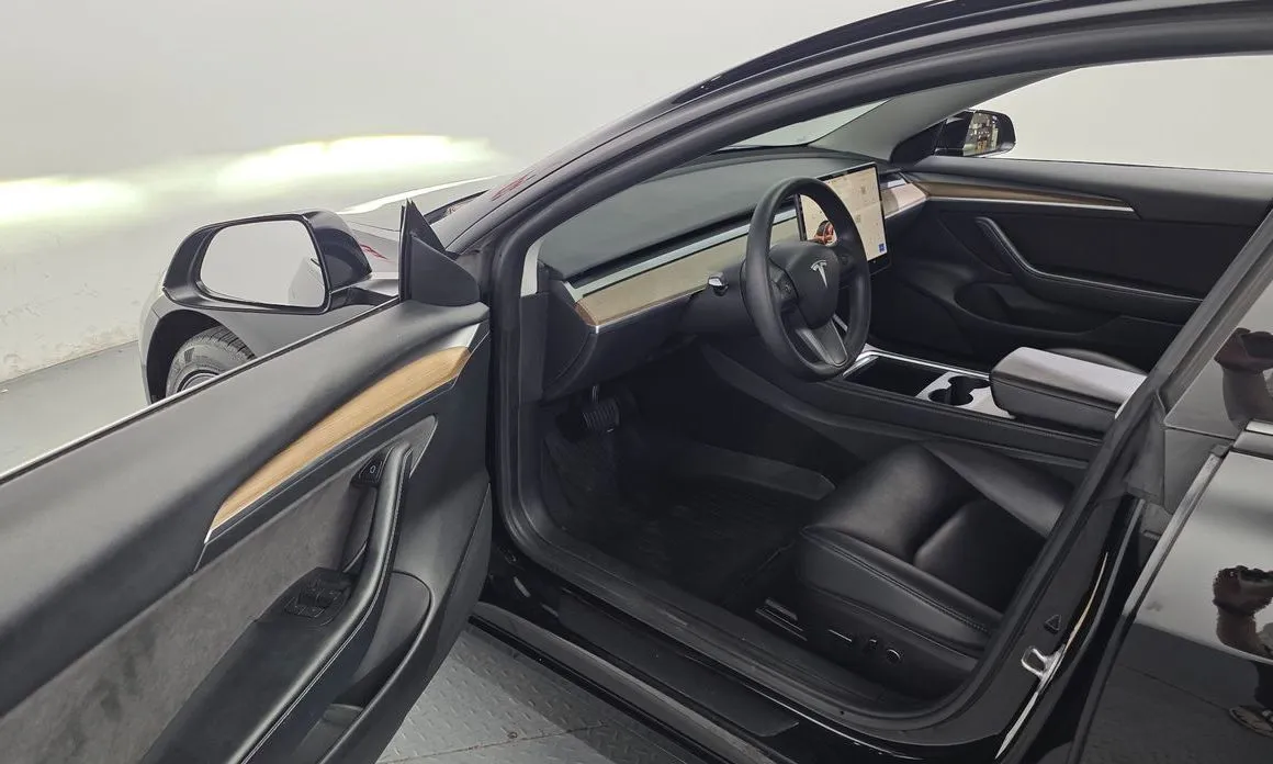 Tesla Model 3 — фото 10