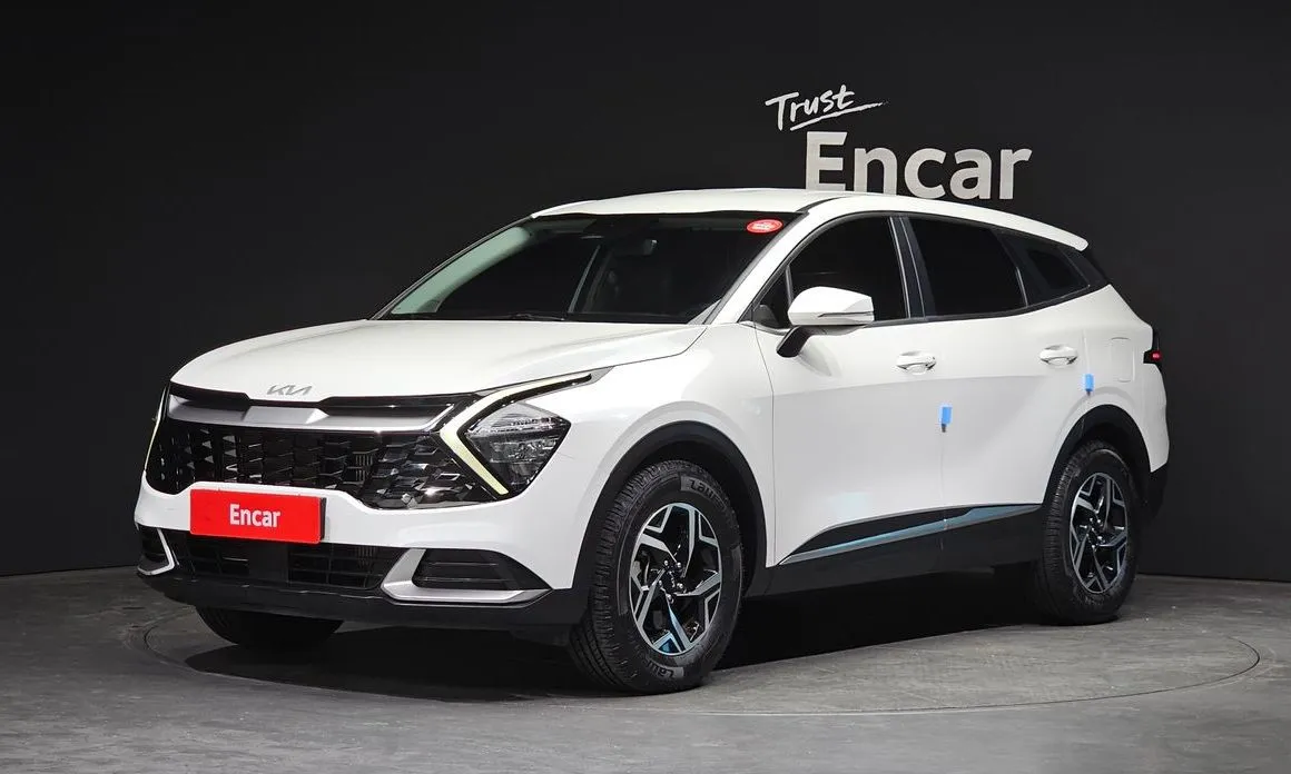 Kia Sportage — фото 1