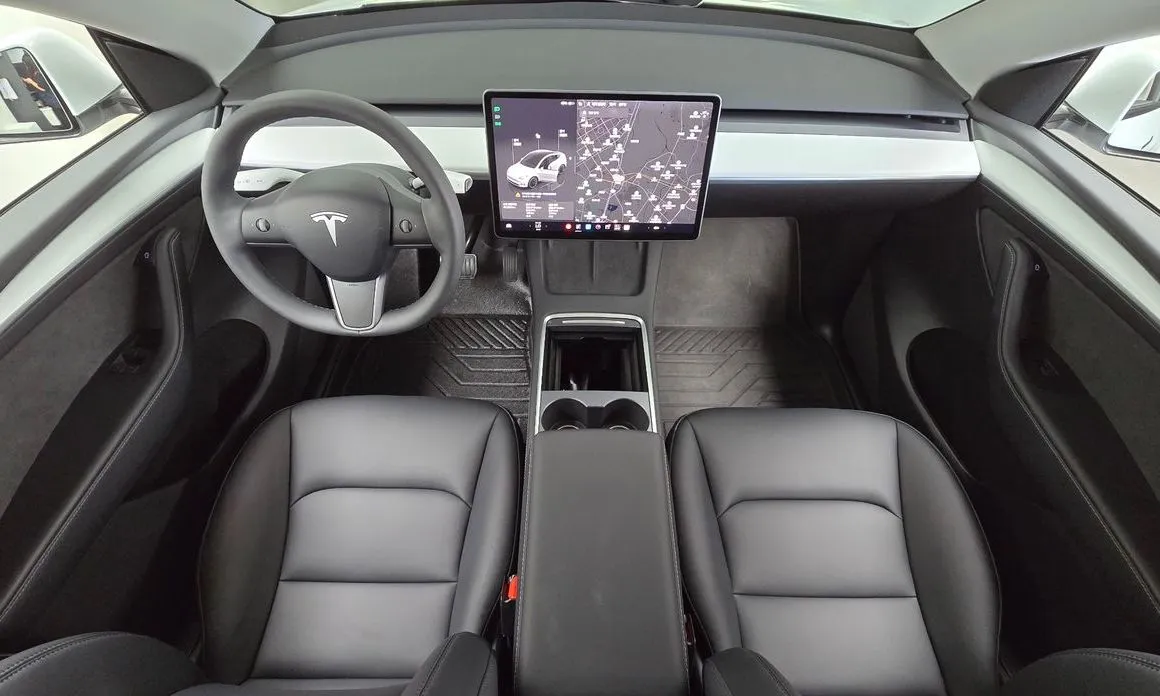 Tesla Model Y — фото 9