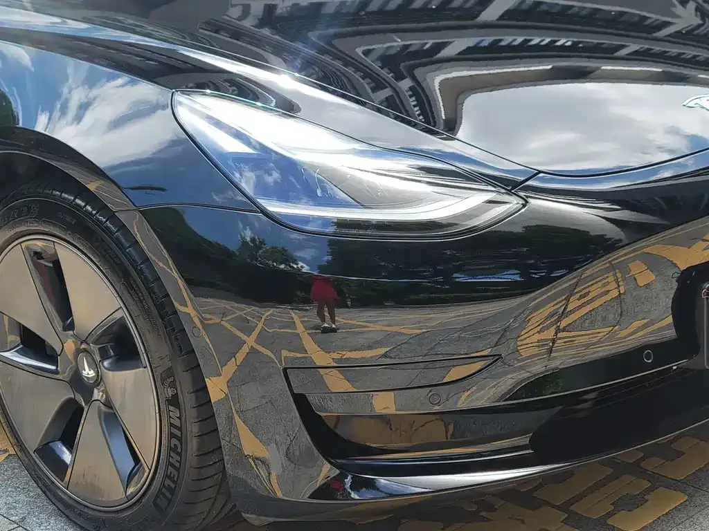 Tesla Model 3 — фото 8