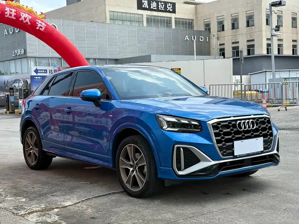 Audi Q2L — фото 10