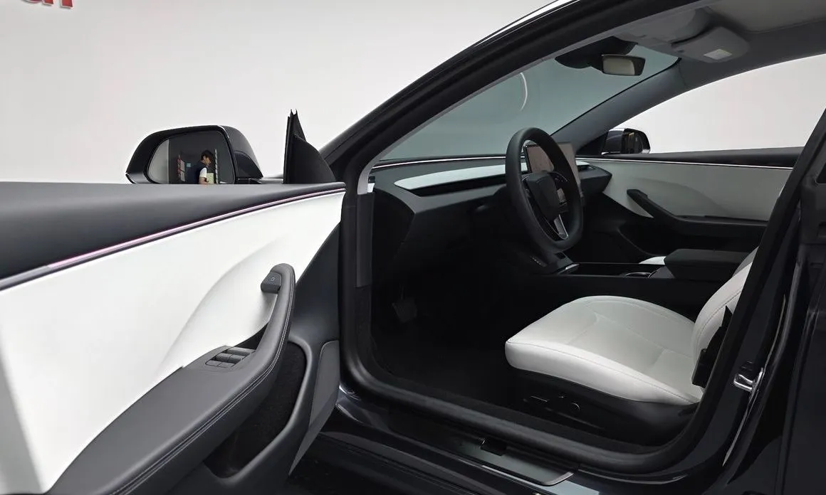 Tesla Model 3 — фото 10