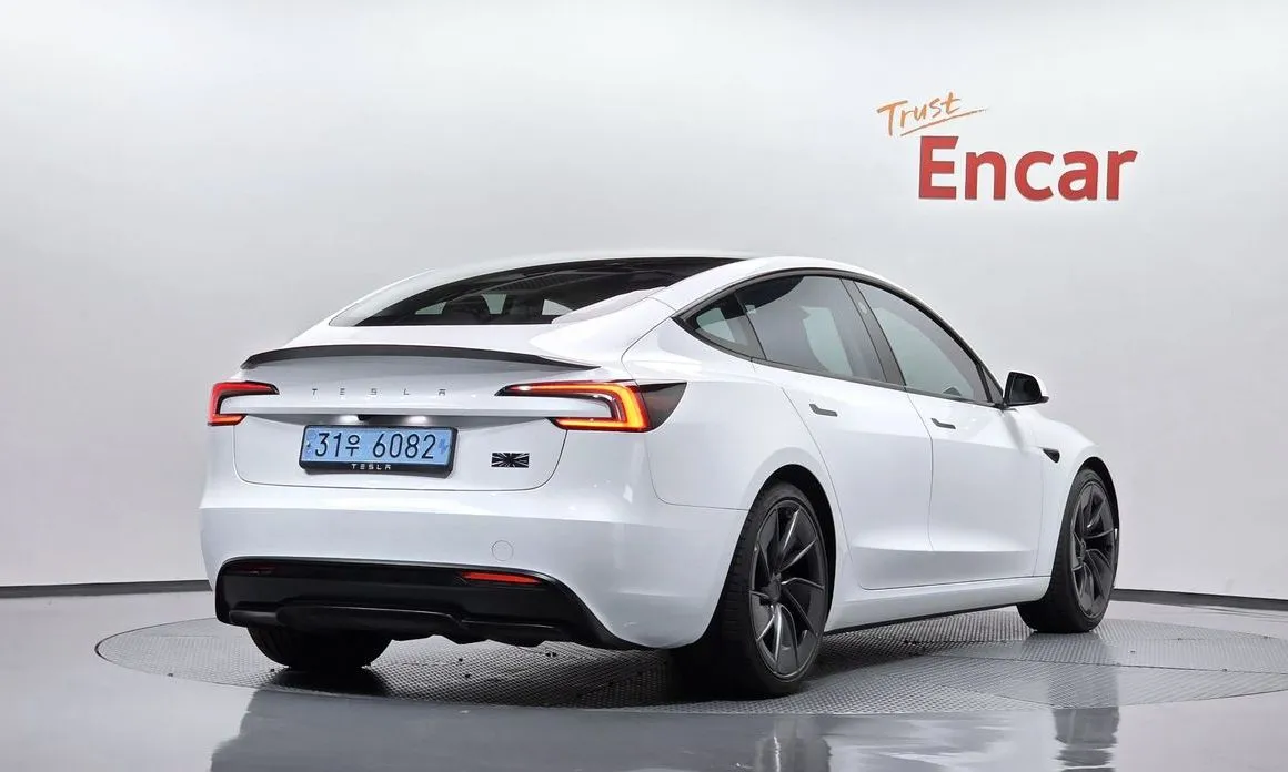 Tesla Model 3 — фото 7
